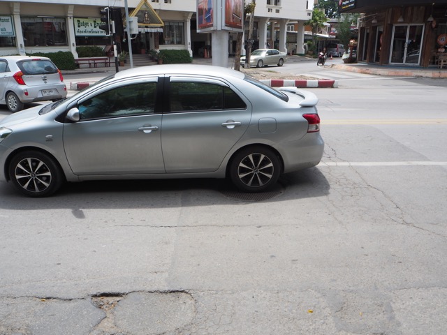 Unevenness in roads in Thailand can cause you to get off balance