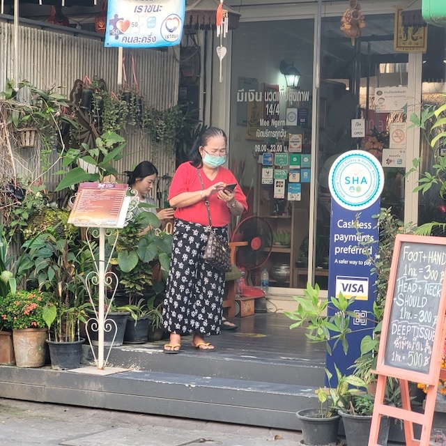 Massage shop owner quickly calling her list of freelancers